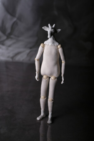 xii. the giraffe/hanged man